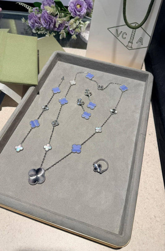 Van Cleef & Arpels Alhambra Jewelry Set (White Gold with Blue Agate, Mother-of-Pearl, and Guilloché)